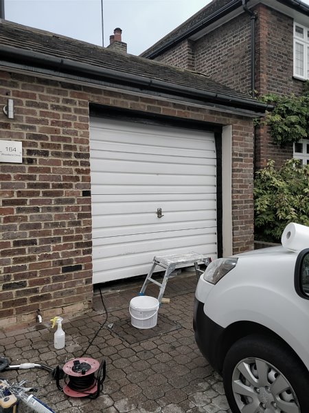 Garage door about to be painted on cassiobury estate in watford